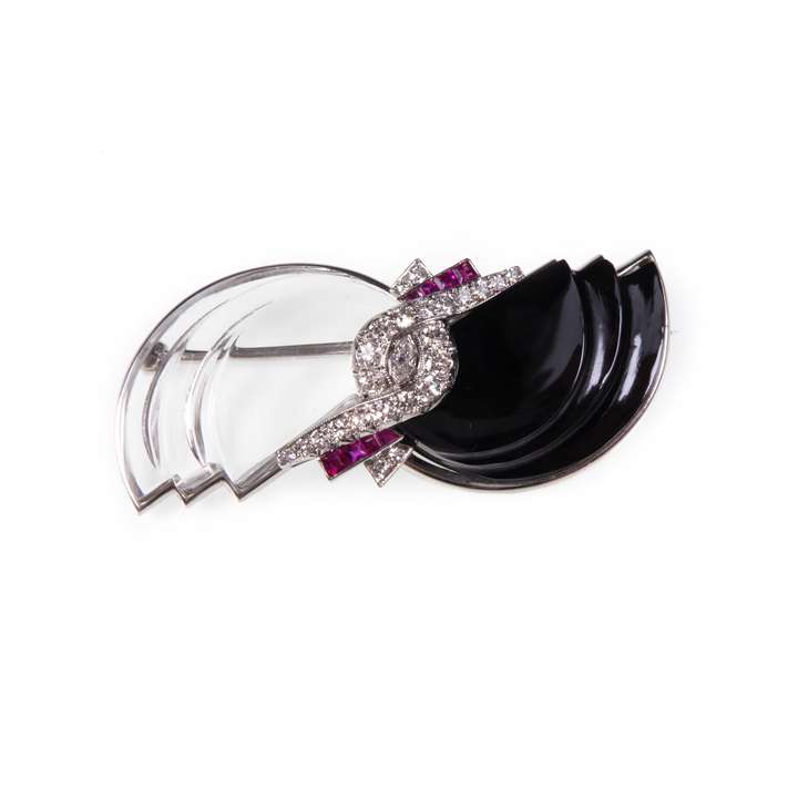 Art Deco carved rock crystal, onyx and diamond brooch the stylised yin-yang of geometric half-moon design